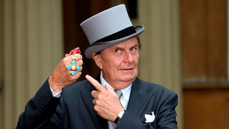Australia&#39;s Barry Humphries poses after receiving his Most Excellent Order of the British Empire from the Queen at Buckingham Palace, London October 10, 2007. REUTERS/Steve Parsons/Pool (BRITAIN)
