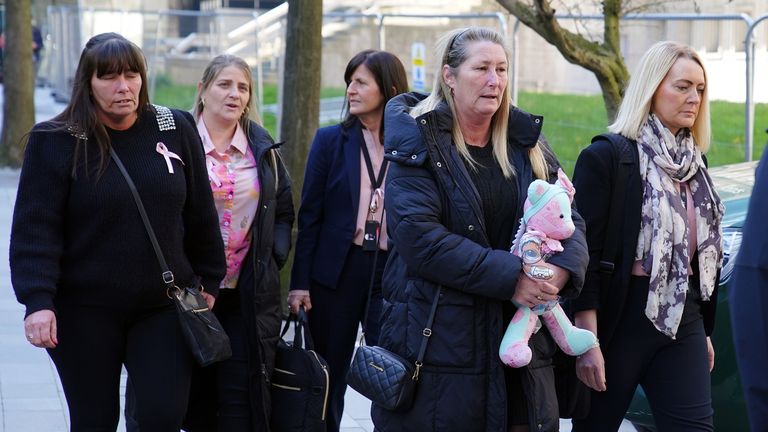 Cheryl Korbel, (second right) mother of nine-year-old Olivia Pratt-Korbel, arrives at Manchester Crown Court