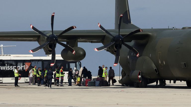 British nationals evacuated from Sudan arrive at the Larnaca International Airport, in Larnaca, Cyprus, April 26, 2023. REUTERS/Yiannis Kourtoglou
