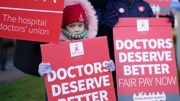 A child joins striking NHS junior doctors on the picket line outside Leicester Royal Infirmary as the BMA holds a 96-hour walkout in a dispute over pay. Picture date: Tuesday April 11, 2023.