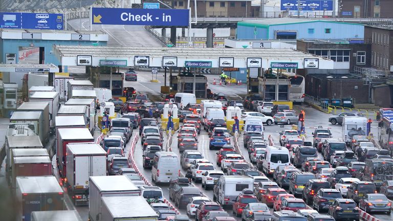 Coach and lorries wait for French border checks on Saturday