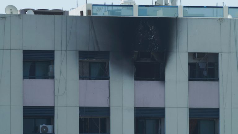 Char marks are seen after an apartment fire in Dubai, United Arab Emirates, Sunday, April 16, 2023. A fire swept through an apartment building in an older neighborhood of Dubai in the United Arab Emirates, killing multiple people and injuring another several, authorities said Sunday. (AP Photo/Jon Gambrell)