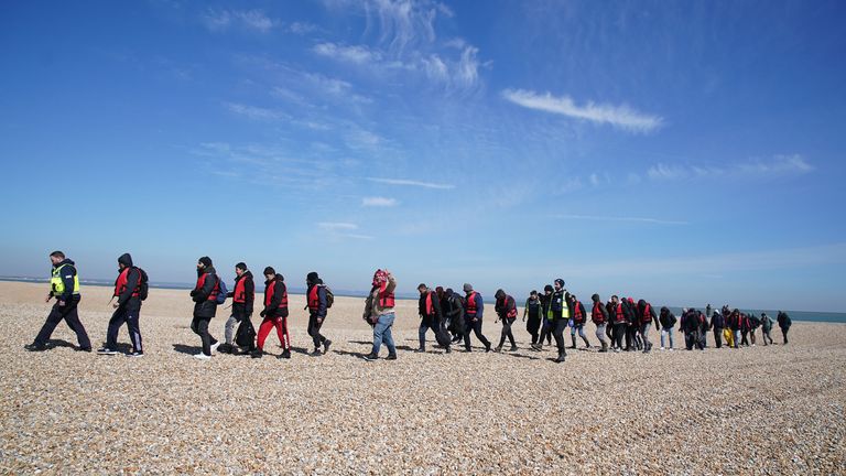 A group of people thought to be migrants are brought in to Dungeness, Kent, by the RNLI, following a small boat incident in the Channel. Picture date: Tuesday April 4, 2023.