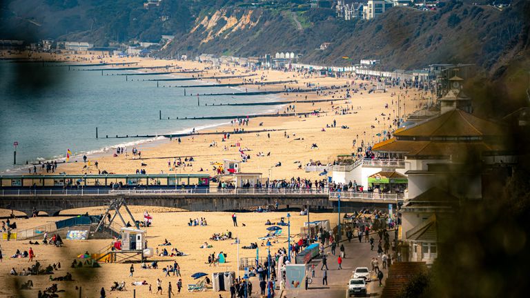 People enjoying the warm weather on Bournemouth beach over the Easter Bank Holiday weekend.