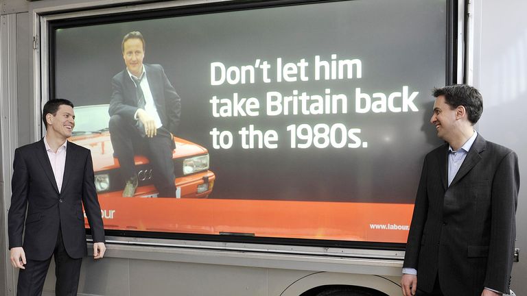 Foreign Secretary David Miliband (left) and his brother Secretary of State for Energy and Climate Change Ed Miliband, during the launch of their party&#39;s latest poster campaign, in Basildon, Essex, depicting Conservative Party leader David Cameron as TV detective Gene Hunt, designed to revive memories of 1980&#39;s social unrest and youth unemployment.