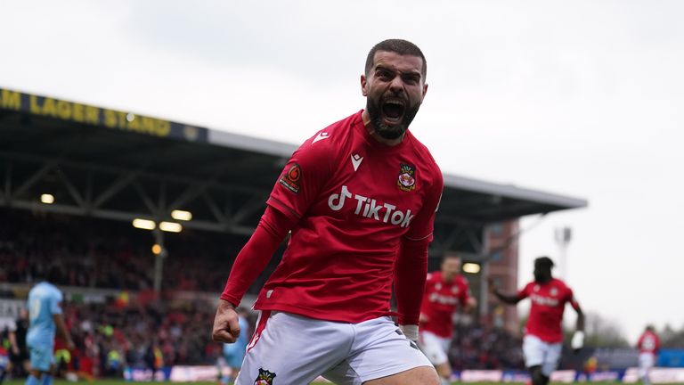 Wrexham&#39;s Elliott Lee celebrates scoring the first goal of the game which concluded 3-1 