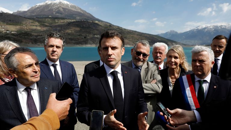 French President Emmanuel Macron, center, speaks to journalists upon his arrival in Sainte-Savine-Le-Lac, southeastern France, Thursday, March 30, 2023. Emmanuel Macron presented a plan for saving France&#39;s water after exceptional winter drought, February wildfires and violence between protesters and police over an agricultural reservoir. Pic: AP