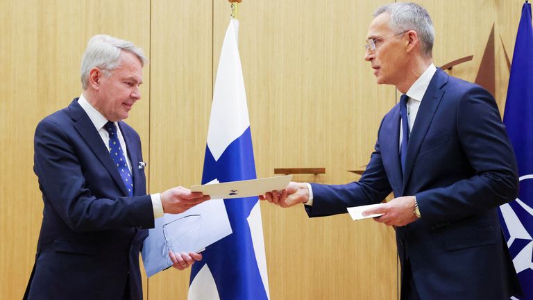 Finnish Foreign Minister Pekka Haavisto hands over his nation&#39;s accession document to NATO Secretary-General Jens Stoltenberg during a joining ceremony at the NATO foreign ministers&#39; meeting at the Alliance&#39;s headquarters in Brussels, Belgium April 4, 2023. REUTERS/Johanna Geron/Pool