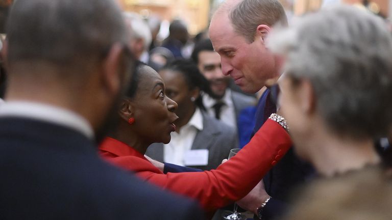The Prince of Wales speaks with Baroness Floella Benjamin (centre) during the annual Commonwealth Day Reception hosted by the King and the Queen Consort at Buckingham Palace in London for the Commonwealth Secretary-General, High Commissioners, Foreign Affairs Ministers and other members of the Commonwealth community. Picture date: Monday March 13, 2023.