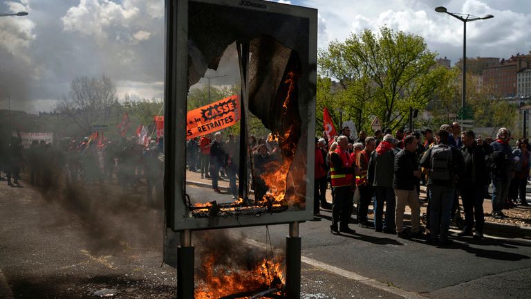 Protesters match during a demonstration in Lyon, central France, Thursday, April 13, 2023. Protesters opposing President Emmanuel Macron...s unpopular plan to raise the retirement age to 64 marched Thursday in cities and towns around France, in a final show of anger before a decision on whether the measure meets constitutional standards. (AP Photo/Laurent Cipriani)