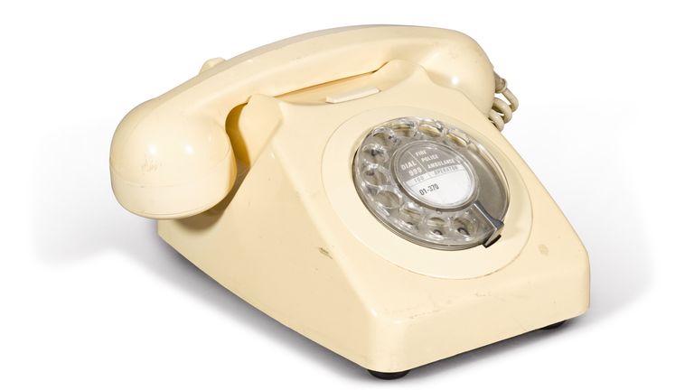 A 1980s vintage white telephone is among the 1,500 items