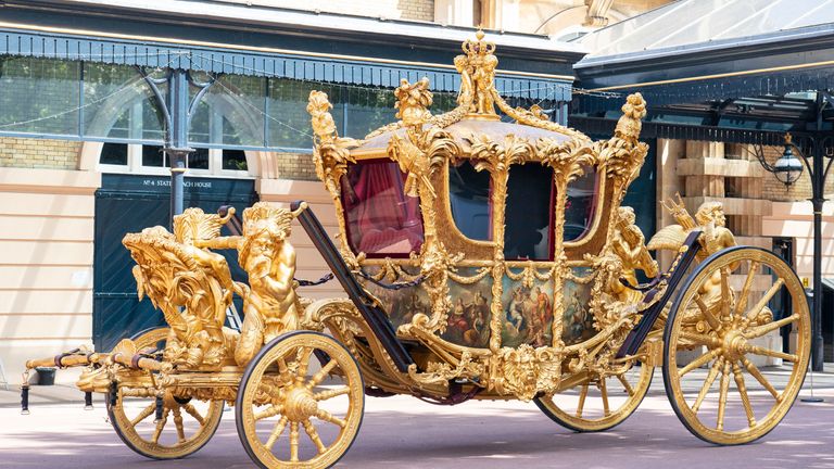 A general view of the Gold State Coach, at the Royal Mews, Buckingham Palace, London, Friday May 6, 2022. The coach will be used as part of Queen&#39;s Platinum Jubilee celebrations. 