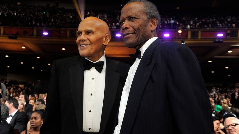 Harry Belafonte, left, and Sidney Poitier pose in the audience at the 43rd NAACP Image Awards on Friday, Feb. 17, 2012, in Los Angeles. (AP Photo/Chris Pizzello)


