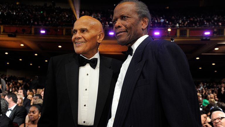 Harry Belafonte, left, and Sidney Poitier pose in the audience at the 43rd NAACP Image Awards on Friday, Feb. 17, 2012, in Los Angeles. (AP Photo/Chris Pizzello)


