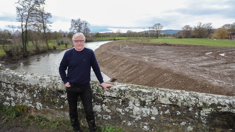 John Price on the bankside of the River Lugg in Kingsland. December 8 2020. 
Pic:SWNS