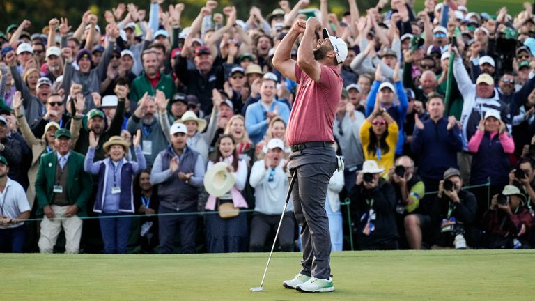 Jon Rahm, of Spain, celebrates on the 18th green after winning the Masters golf tournament at Augusta National Golf Club on Sunday, April 9, 2023, in Augusta, Ga. (AP Photo/Mark Baker)