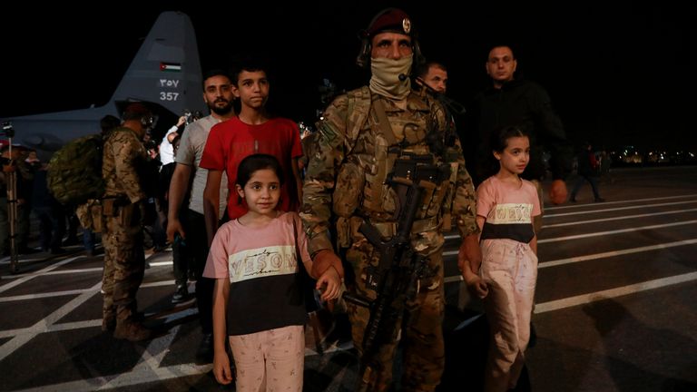 Jordanians evacuated from Sudan arrive at a military airport in Amman, Jordan