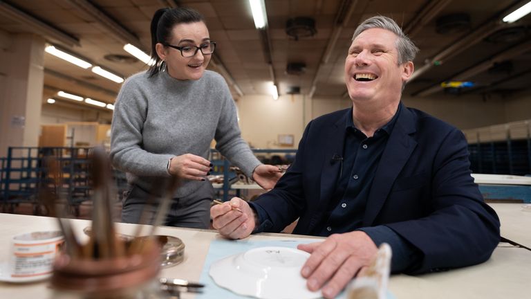 Labour Party leader Sir Keir Starmer is shown how to gild a Coronation commemorative plate by Emma Dudley at Royal Crown Derby during a local election campaign visit to Derbyshire. Picture date: Friday April 28, 2023.
