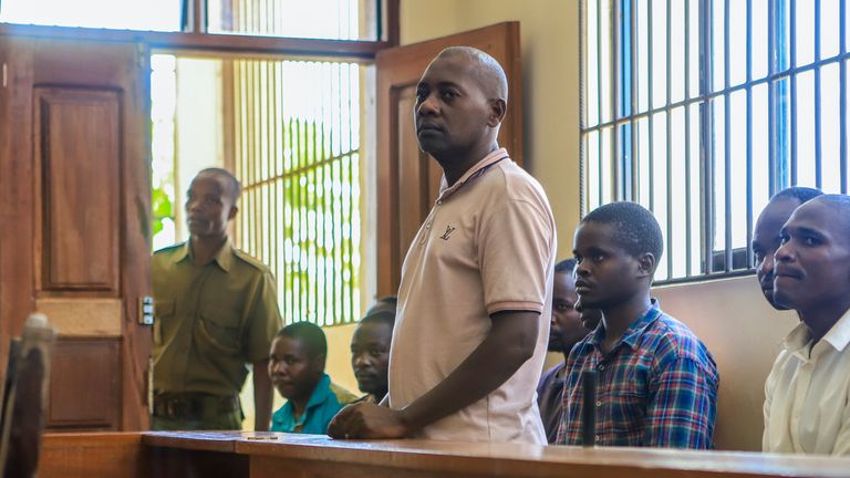 Paul Mackenzie (standing, middle) at a court in Malindi last week. Pic: AP