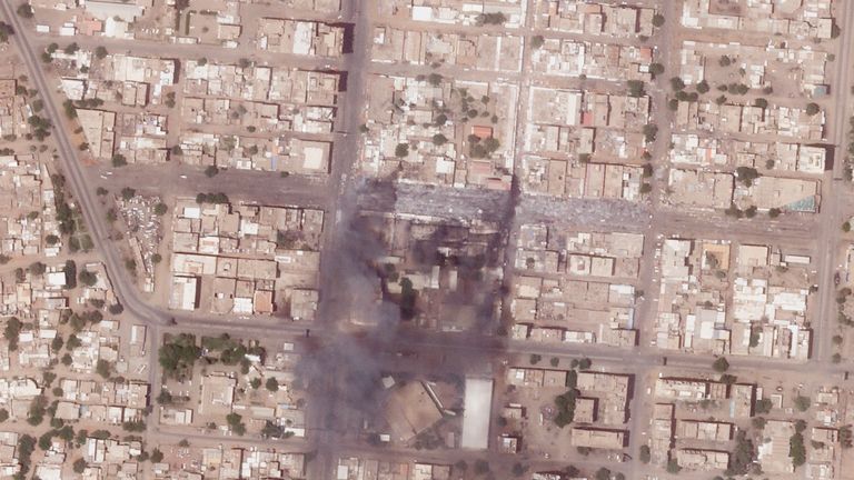 This satellite photo from Planet Labs PBC shows fires and destroyed market stalls in a commercial area of northern Khartoum, Sudan, Tuesday, April 18, 2023. Fighting between forces loyal to dueling generals raged in Sudan for a fifth day Wednesday, April 19, hours after an internationally brokered truce was supposed to have come into effect. (Planet Labs PBC via AP)