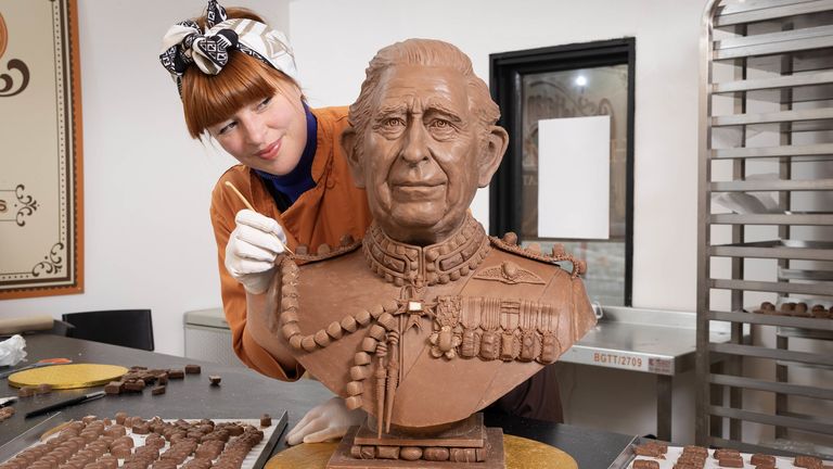 EMBARGOED TO 0001 WEDNESDAY APRIL 26 EDITORIAL USE ONLY Chocolatier Jennifer Lindsey-Clarke adds the finishing touches to bust of King Charles III made from Celebrations chocolates ahead of the Coronation. Issue date: Wednesday April 26, 2023. 