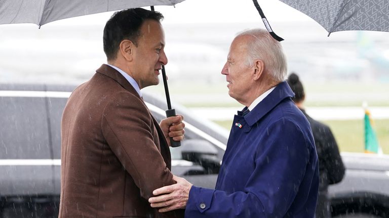 Ireland&#39;s Prime Minister (Taoiseach) Leo Varadkar greets U.S. President Joe Biden as he arrives at Dublin International Airport, in Dublin, Ireland April 12, 2023. REUTERS/Kevin Lamarque
