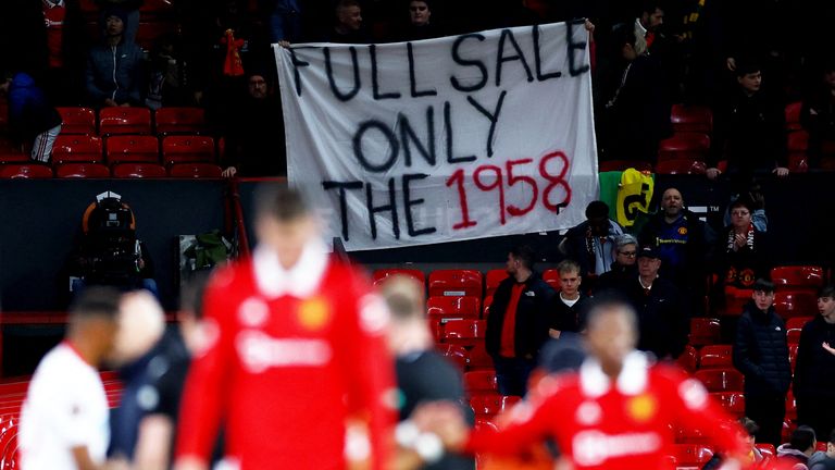 Soccer Football - Europa League - Quarter Final - First Leg - Manchester United v Sevilla - Old Trafford, Manchester, Britain - April 13, 2023 Manchester United fans display a banner after the match Action Images via Reuters/Lee Smith