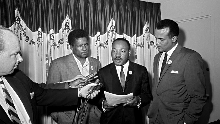Dr. Martin Luther King Jr., center, heads the Southern Christian Leadership Conference. Singer Harry Belafonte, right, was an objective observer. King and Foreman said they would continue to work together despite differences of opinion