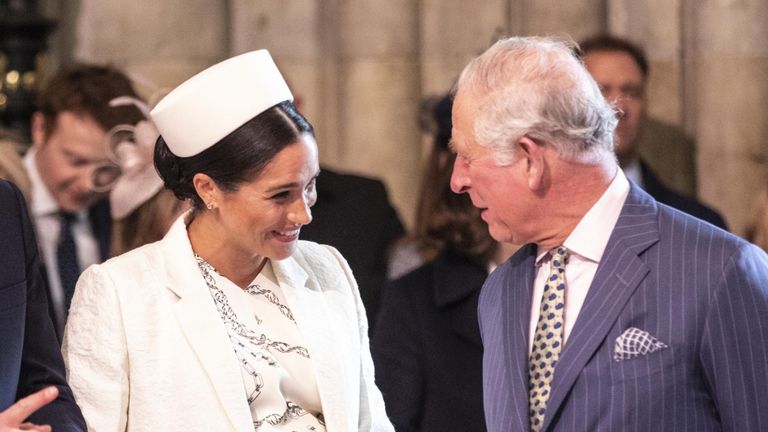 Meghan with King Charles, who was then the Prince of Wales, in 2019