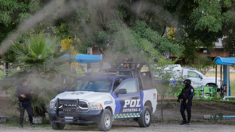 Authorities work at a crime scene where gunmen killed several people including a minor after storming a water park, in Cortazar, Guanajuato state, Mexico April 15, 2023.REUTERS/Sergio Maldonado