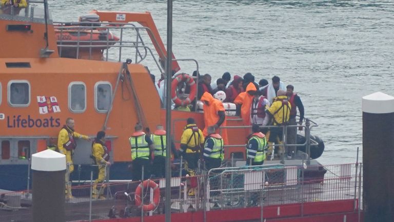 A group of people thought to be migrants are brought in to Dover, Kent, from an RNLI lifeboat