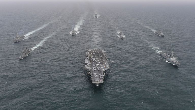 Naval vessels from South Korea, the U.S. and Japan navies take part in a combined anti-submarine exercises at an open water off southern Jeju island, South Korea