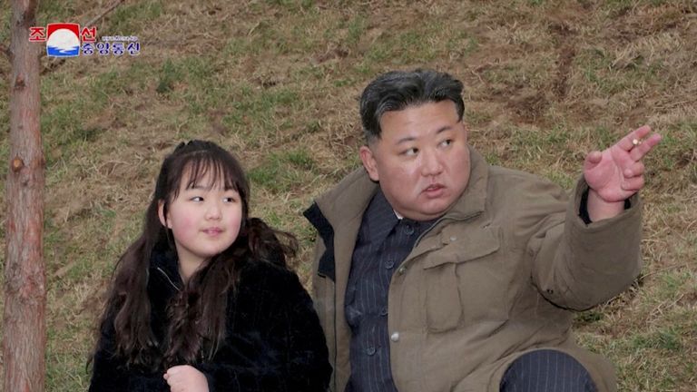 North Korean leader Kim Jong Un and his daughter Kim Ju Ae attend a test launch of a new solid-fuel intercontinental ballistic missile (ICBM) Hwasong-18 at an undisclosed location