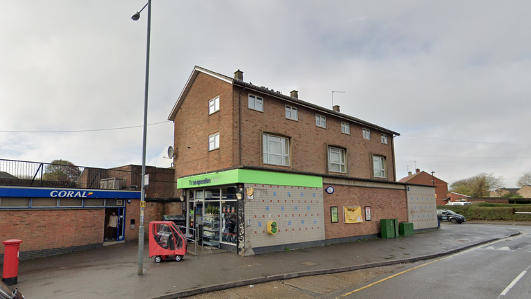 Police say four workers were sprayed with a &#39;noxious substance&#39; at a Co-Op store in Corby, Northamptonshire, on Easter Sunday. Pic: Google Street View.