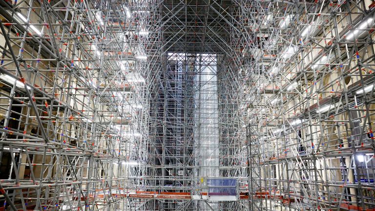 Scaffolding inside the nave of the Notre-Dame de Paris Cathedral, which was damaged in a devastating fire four years ago, as restoration works continue, in Paris, France, April 14, 2023.  REUTERS/Sarah Meyssonnier/Pool