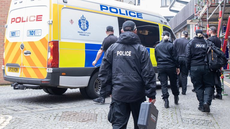 Officers from Police Scotland outside the headquarters of the Scottish National Party (SNP) in Edinburgh following the arrest of former chief executive Peter Murrell. Police Scotland are conducting searches at a number of properties in connection with the ongoing investigation into the funding and finances of the party. Picture date: Wednesday April 5, 2023.
