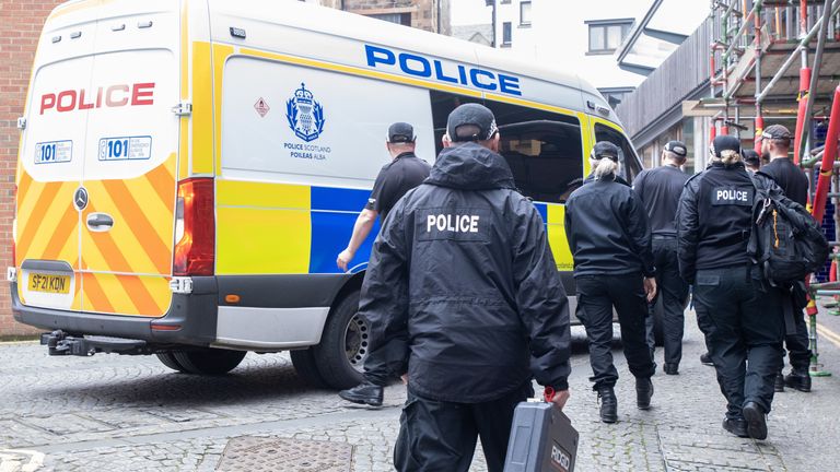 Officers from Police Scotland outside the headquarters of the Scottish National Party (SNP) in Edinburgh following the arrest of former chief executive Peter Murrell. Police Scotland are conducting searches at a number of properties in connection with the ongoing investigation into the funding and finances of the party. Picture date: Wednesday April 5, 2023.
