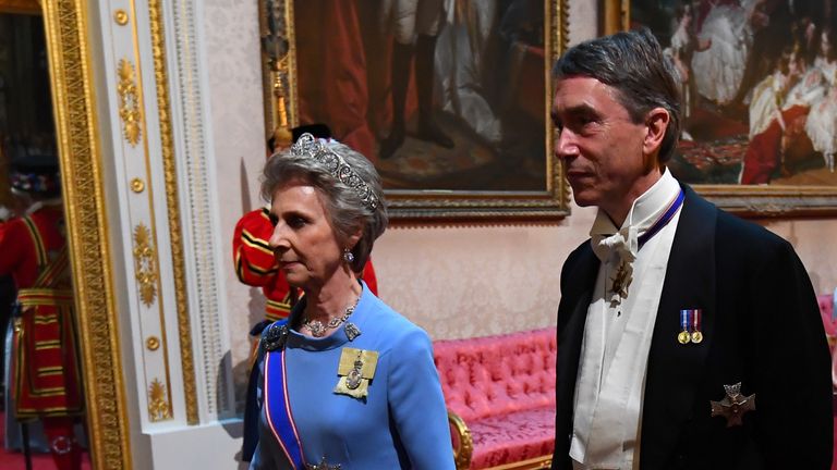 Lord Oliver Cholmondeley&#39;s father David Cholmondeley accompanies the Duchess of Gloucester at a state banquet