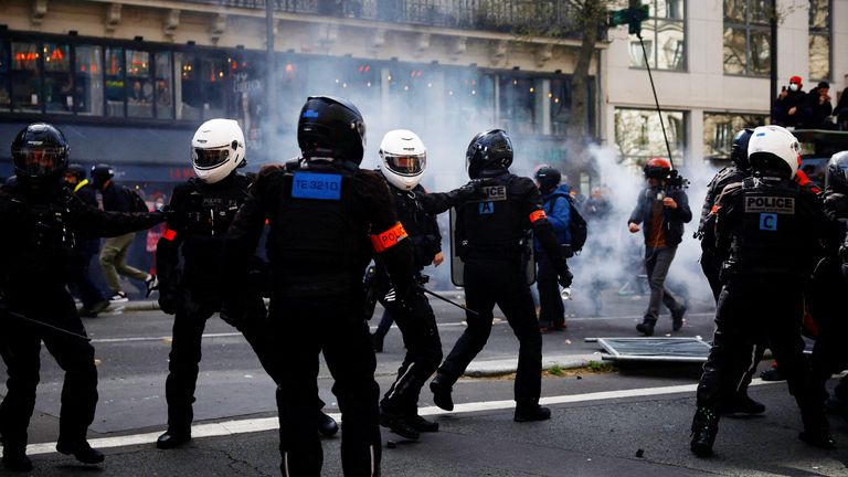 Members of the BRAV-M, the motorized violent action repression police Brigades, react amid tear gas during clashes with protesters at a demonstration as part of the eleventh day of nationwide strikes and protests against French government&#39;s pension reform, in Paris, France, April 6, 2023.   REUTERS/Sarah Meyssonnier 