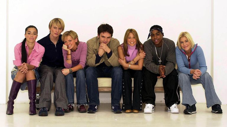 Pop group S Club 7 (L-R) Tina Barrett, Jon Lee, Hannah Spearritt, Paul Cattermole, Rachel Stevens, Bradley McIntosh and Jo O&#39;Meara. *27/03/02  