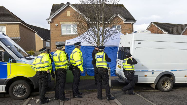 Police officers outside the home of former Scottish National Party (SNP) leader Peter Murrell, in Uddingston, Glasgow, after he was 