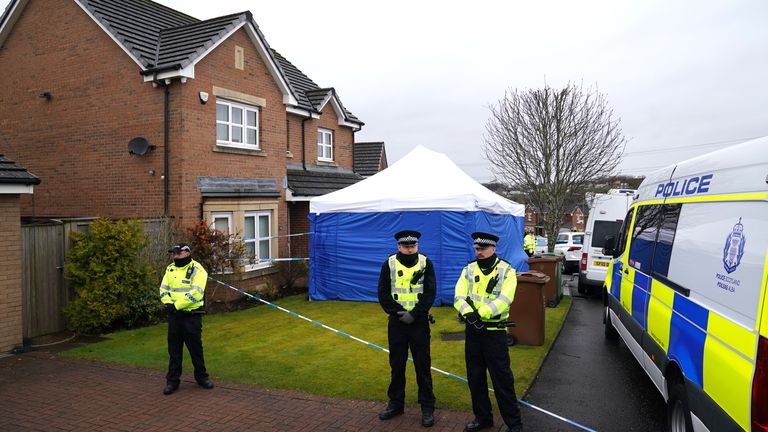 Officers from Police Scotland stand beside by police tape and a police tent outside the home of former chief executive of the Scottish National Party (SNP) Peter Murrell, in Uddingston, Glasgow, after he was arrested in connection with the ongoing investigation into the funding and finances of the party. Picture date: Wednesday April 5, 2023.