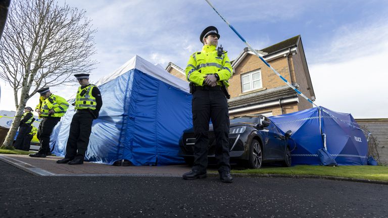Scottish Police officers outside the home of former Scottish National Party (SNP) leader Peter Murrell in Uddingston, Glasgow after he was 