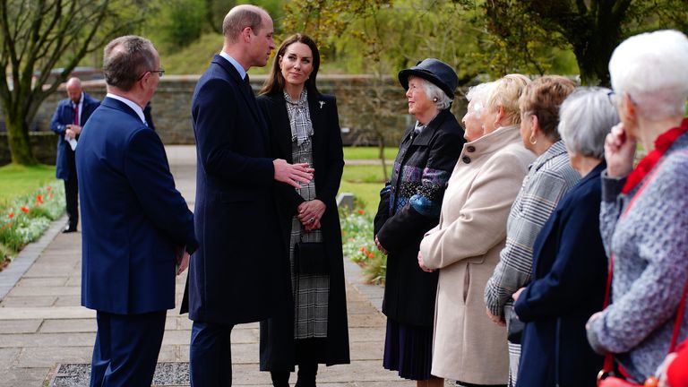 The Prince and Princess of Wales (centre) speak to &#39;Aberfan Wives&#39; during a visit to the Aberfan memorial garden, to pay their respects to those who lost their lives during the Aberfan disaster on October 21st 1966. Picture date: Friday April 28, 2023.
