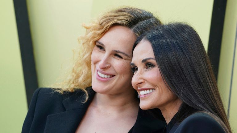 Rumer Willis, left, and Demi Moore arrive at the Versace Fall/Winter collection presentation on Thursday, March 9, 2023, at the Pacific Design Center in West Hollywood, Calif. (Photo by Jordan Strauss/Invision/AP)
