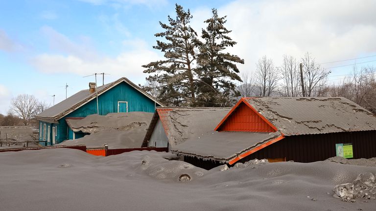 Volcanic ash covers the ground and houses after the Shiveluch volcano erupted in Klyuchi village on the Kamchatka Peninsula in Russia 
PIC:AP