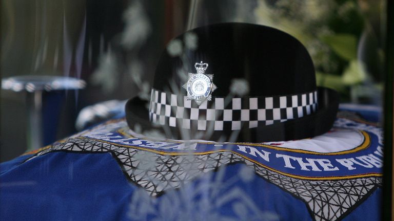 PC Beshenivsky&#39;s hat sits on her coffin at her funeral on 11 January 2006