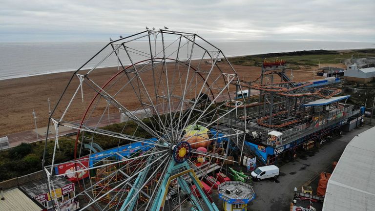 (EDITORS NOTE: Image taken with drone) Aerial view of the Seafront and amusement park in Skegness, Lincolnshire. Skegness is a tourist destination in the UK which has also become a destination for housing migrants. Four hotels along the seafront have been let out to migrants and there are fears this will have a negative impact on the local economy.

