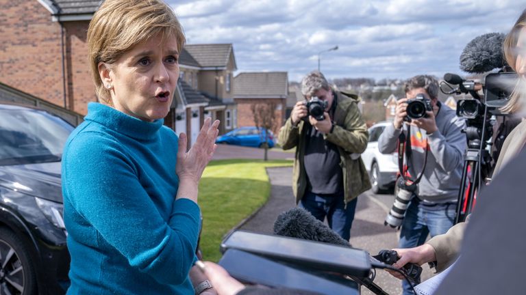 Nicola Sturgeon talks to the press outside her Glasgow home