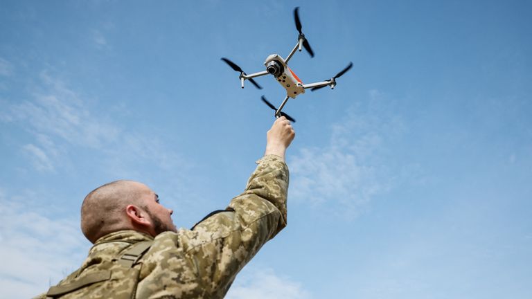 A recruit of the Steel Border storm brigade practises launching drones, at the unit&#39;s base in central Ukraine March 24, 2023. REUTERS/Alina Yarysh
